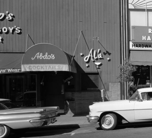 Sully's at night, glowing neon